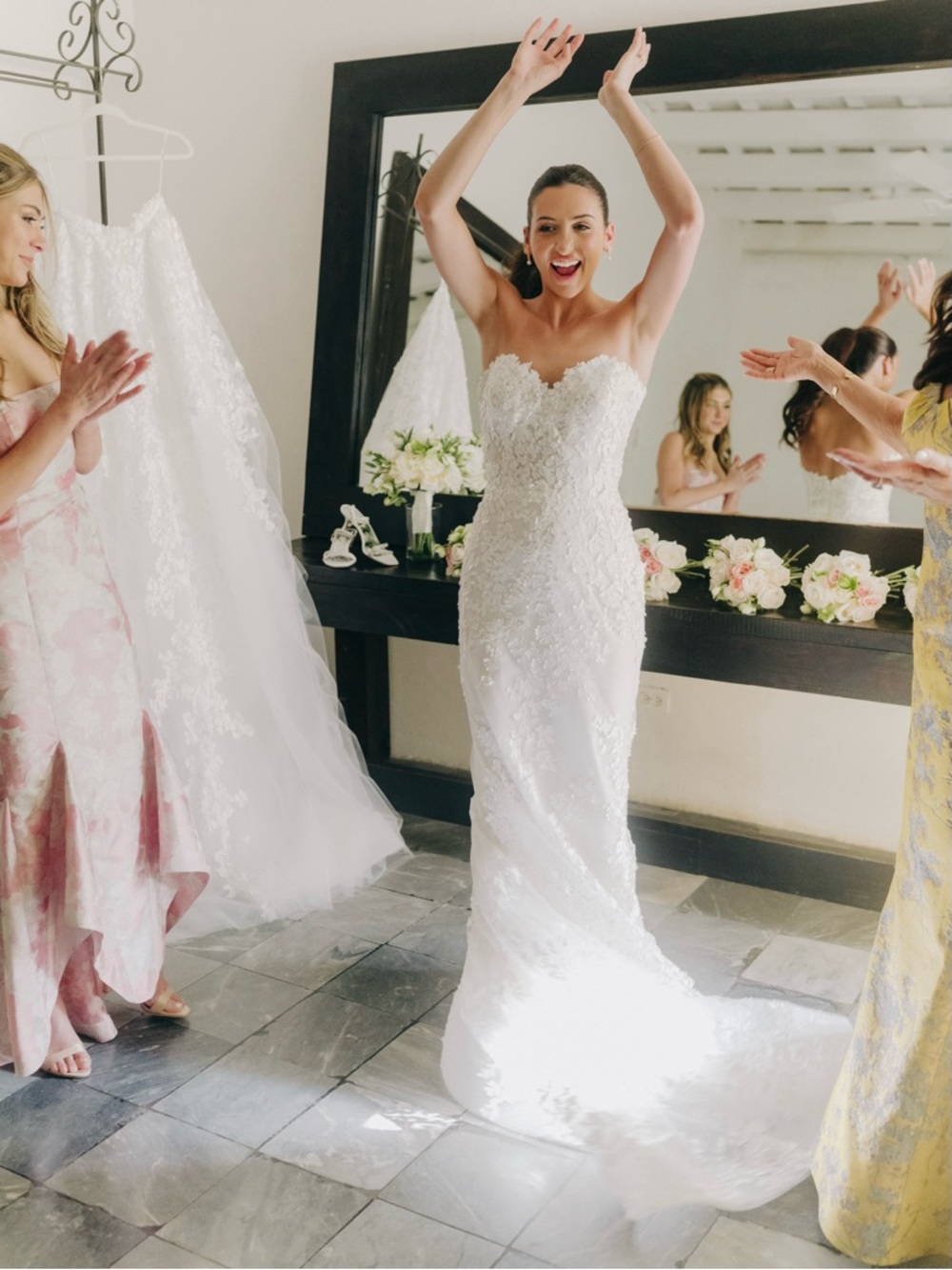 Strapless designer lace wedding dress form fitted with matching veil/overskirt